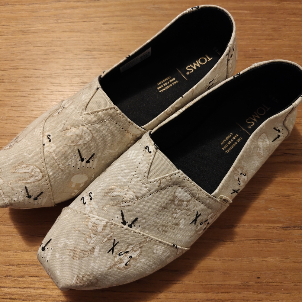 TOMS Cream Patterned Slip-On Loafers